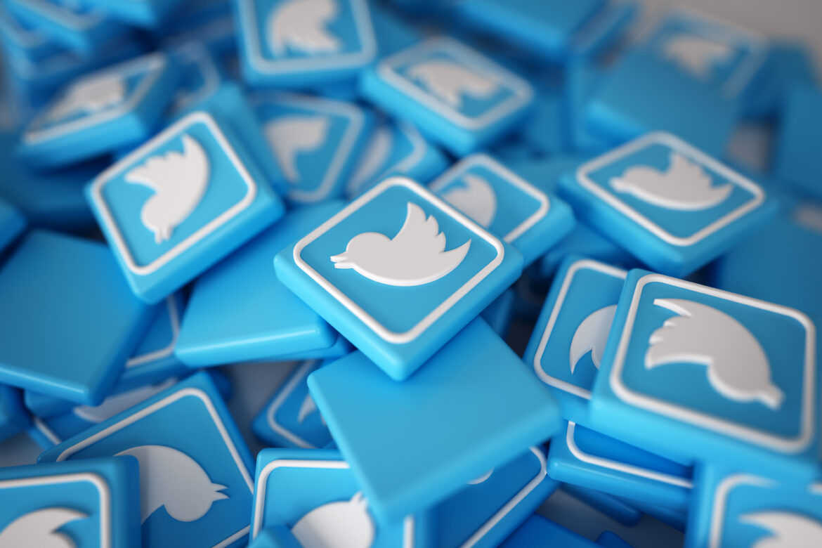 Pile of 3D Twitter Logos Musk Agrees to Twitter Purchase at Original Price.